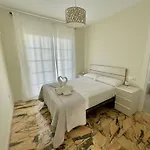 Mimosa Vila *